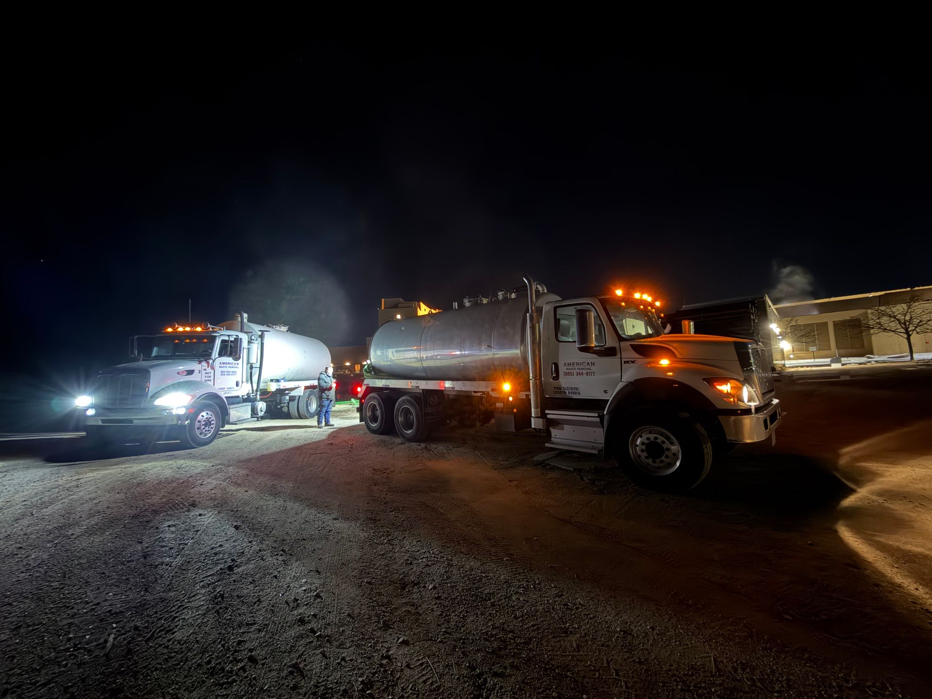 American Waste Removal grease trap service truck on site