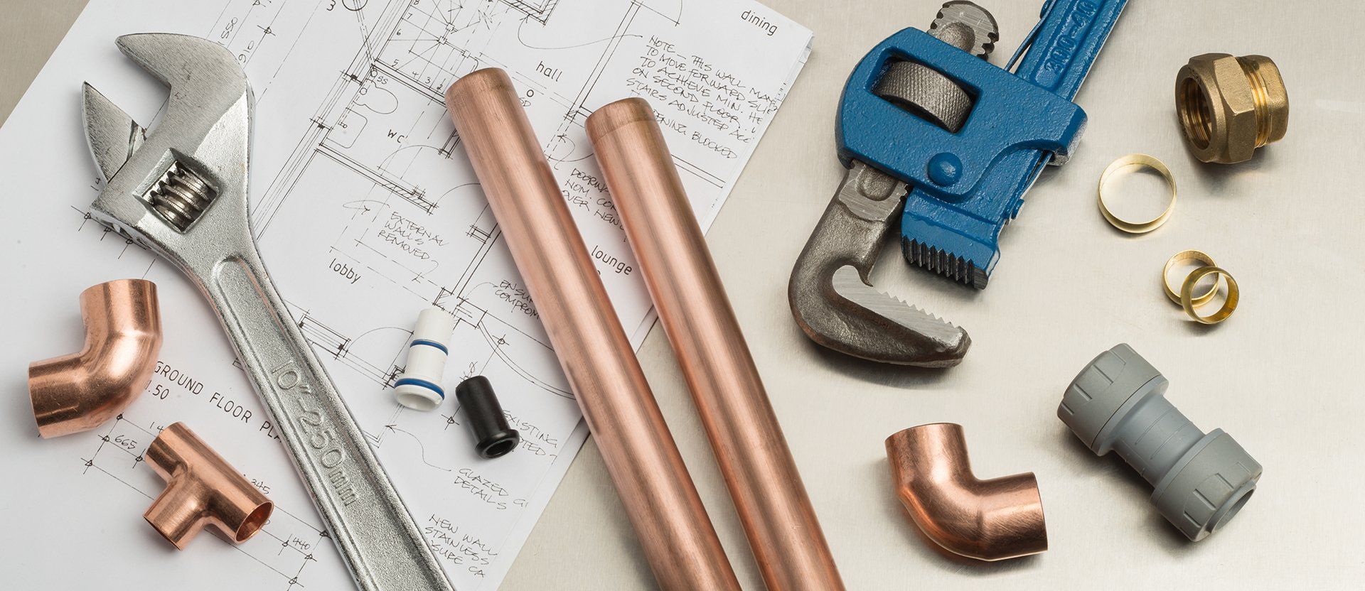 AWR Plumbing technician servicing a residential water heater in Albuquerque, NM